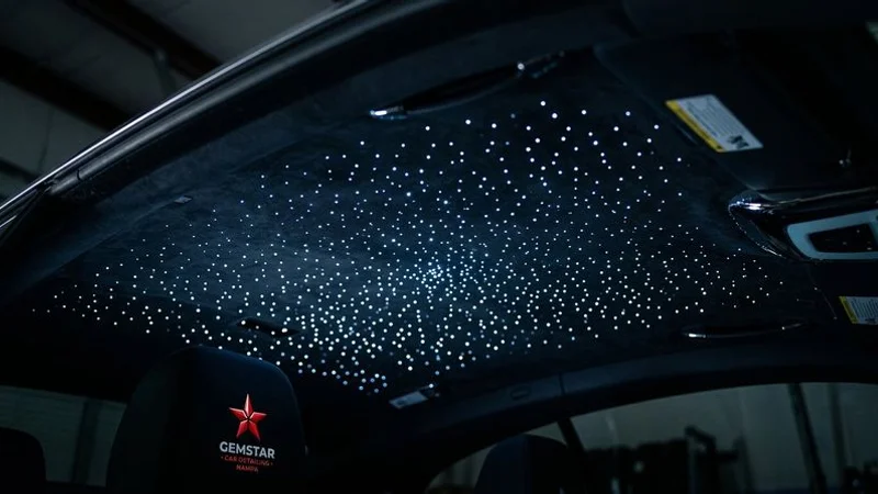 Starlight headliner illuminated showing fiber optic starry sky effect